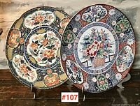 Front view of both charger plates side by side on stands