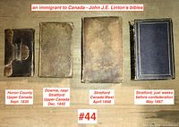 Overview of four leather-bound books arranged side by side with labels indicating dates and locations.
