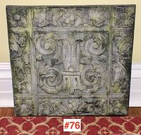 Full view of large decorative stone composite tile with intricate floral and swirl design.