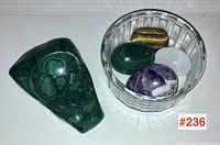 Malachite pin dish, five polished eggs in amethyst, quartz, malachite, and tiger's eye, with a polished tiger's eye stone