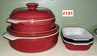 All items: two lidded pots stacked and two rectangular dishes stacked