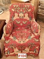 Front view of upholstered armchair in Chinoiserie fabric showing seat, arms and back