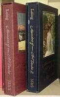 Two boxed editions of "Memoirs of an Art Dealer" by G. Blair Laing, showing the spine sides with titles and author names clearly visible.