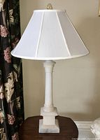 Full view of lamp showing alabaster column, shade and base