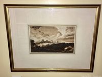 Framed antique print showing full artwork and frame.