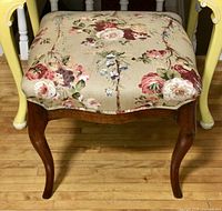 Front view showing overall appearance, upholstery pattern, and leg style