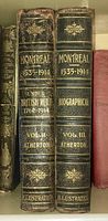 Two volumes of 'Montreal 1535-1914' by Atherton in black leather bindings with gold embossed titles and decorations, showing wear consistent with age.