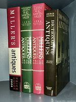 Five hardcover reference books about antiques including Miller's Price Guides (2006, 1986 American and British editions) and Dictionary of Antiques by George Savage (Second Edition).