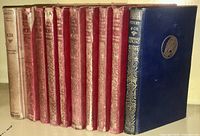 Full group shot of eight volumes on shelf