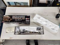 Box and contents laid out showing Matco Tools branding and certificate of authenticity.