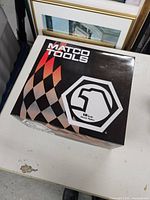 Closed box with Matco Tools branding and 1:9 scale diecast replica label.