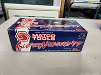 Box of Matco Tools Super Nationals '99 1:24 scale Nitro Funny Car die cast model, showing front and side panels with branding and eagle graphic.