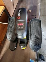 Top view of Orbitrek MX elliptical trainer showing foot pedals and digital console