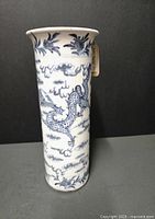 Front view of vase showing dragon and cloud decoration