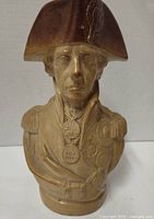 Front view of jug depicting Admiral Lord Nelson bust with bicorn hat and medals