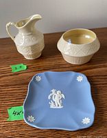 Photo of Belleek creamer, sugar bowl, and Wedgwood trinket dish together with size labels