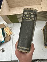 Top view of the spine of the dictionary showing the title and publisher.