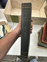 Front spine of the hardcover book showing the title 'Reference Book of Inorganic Chemistry' in gold lettering on a black cloth cover.
