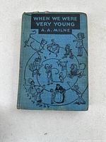 Front cover of 'When We Were Very Young' showing title, author, and illustrated characters on blue background.