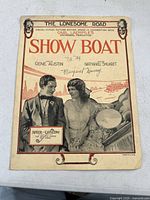 Full cover image of 'The Lonesome Road' sheet music featuring the man and woman illustration and the Show Boat title.