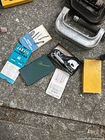 Micrometer tool with accessories, two microphones, clamp device, and accompanying tool selector charts and notebook