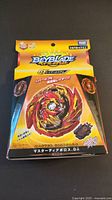 Front view of unopened Master Diablos Beyblade in original packaging showing the Beyblade image and branding.
