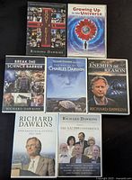 Front cover display of 7 Richard Dawkins DVDs showing titles and cover art of each case.