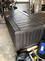 Exterior closed view of storage box showing overall shape and condition