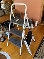 3-step COSCO utility ladder showing full side view, white frame, and gray steps