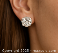 Earring worn on ear to show scale and appearance when worn