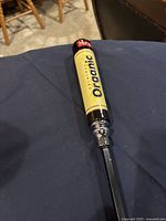 Close-up of the Mill St Organic beer tap handle on the poker, showing label details and chrome fitting.