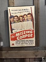 Framed vintage movie poster for ‘The Missing Corpse’ showing main artwork and characters.