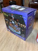 Original box showing the colorful Disney animated pirate ship with characters including Donald Duck and Mickey Mouse. The box shows wear but is intact.