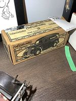 Closed original box of the ERTL 1938 Chevy Panel Truck bank showing printed design and branding.