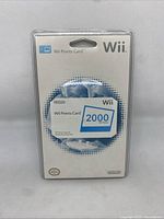 Front view of Nintendo Wii Points Card sealed in plastic packaging with blue and white design.