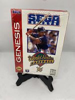 Front view of World Series Baseball '96 Sega Genesis box showing game title, Sega Sports logo, and baseball player image, sealed in original plastic.