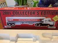 Photo of outer box showing 2001 Collector's Edition branding with image of the Exxon tanker model in black, red, and white.