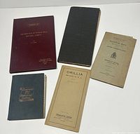 5 maps and memoir publications shown stacked and separate