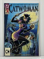Front cover view of DC Catwoman #1 comic from August 1993 showing Catwoman holding a whip with a detailed background.