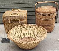 Front view of all three wicker baskets showing shapes and features