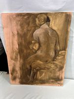 Front view of the oil painting on a canvas showing a seated human figure from the back with a turned head, rendered in browns and beige. The figure holds a small object or cloth on their lap.