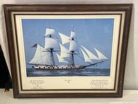 Full view of the framed photographic poster showing the Brig Niagara sailing ship under full sail on calm water.
