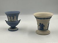 Both Wedgwood jasperware vases together for size and style comparison