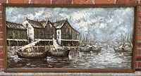 Full view of the original oil painting showing the harbour with boats, buildings, and cloudy sky in a wooden frame.