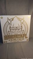 Front view of Hnefatafl Viking Chess game box showing artwork and game title.