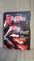 Front view of sealed Rolling Stones The Biggest Bang DVD box set showing colorful lips graphic and title.