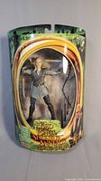 Front view of sealed Legolas action figure packaging with clear plastic showing figure and accessories.