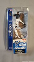 Sealed two-pack baseball figurines of Toronto Blue Jays players Hudson and Catalanotto dated July 31, 2005, front view of the full package