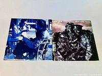 Both vinyl album covers laid side by side showing 'The Jam - Setting Sons' and 'The Style Council - My Ever Changing Moods'.