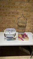 Entire lot showing foot spa, gift set, and shower caddy